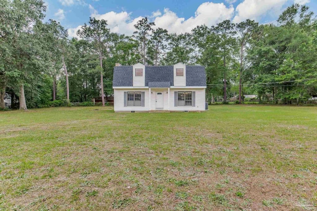 view of front of home with a front yard, crawl space, roof with shingles, and view of scattered trees