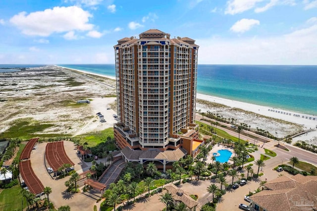 drone / aerial view with a view of the beach and a water view