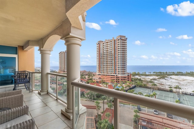 balcony featuring a water view