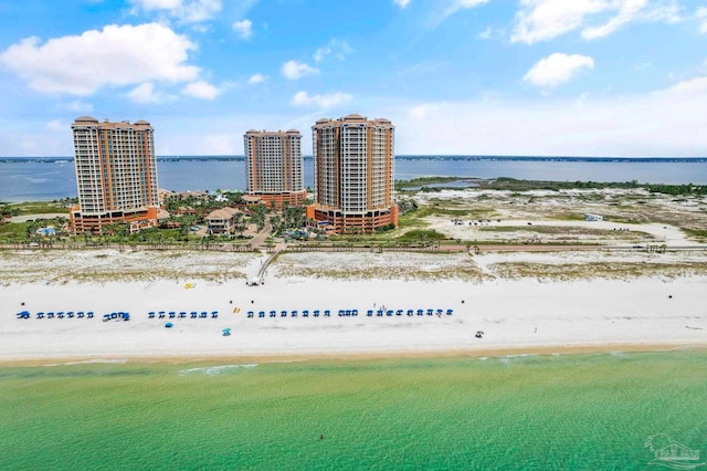 bird's eye view featuring a beach view and a water view