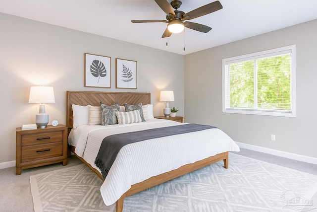 20 Magnolia Ave, Shalimar, FL 32579 - bedroom with light colored carpet and a ceiling fan