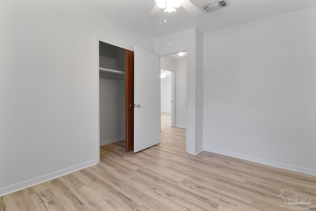 20 Magnolia Ave, Shalimar, FL 32579 - unfurnished bedroom featuring light wood-style floors, a closet, and ceiling fan