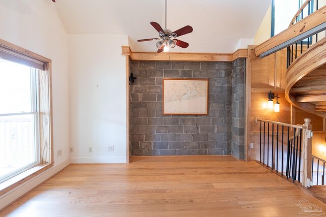 431 E Zarragossa St Unit B, Pensacola, FL 32502 - spare room featuring ceiling fan, plenty of natural light, wood finished floors, vaulted ceiling, and baseboards
