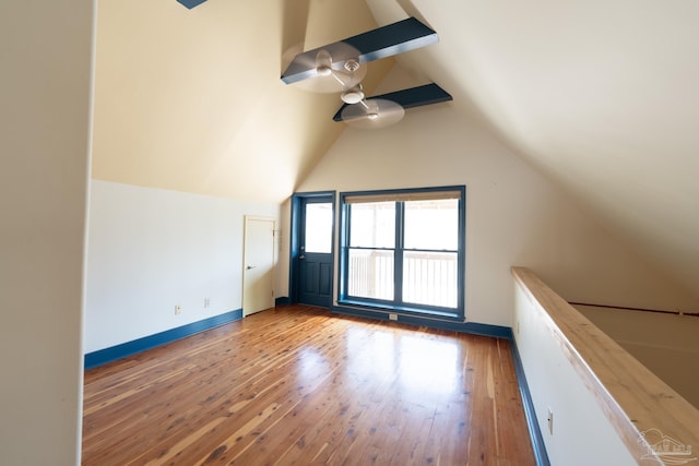 431 E Zarragossa St Unit B, Pensacola, FL 32502 - additional living space featuring vaulted ceiling, light wood-style flooring, and baseboards