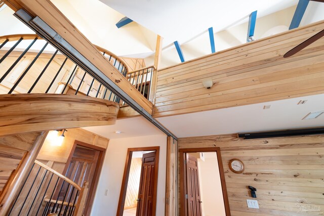 431 E Zarragossa St Unit B, Pensacola, FL 32502 - stairway with wooden walls and a high ceiling