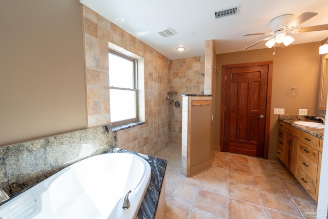 431 E Zarragossa St Unit B, Pensacola, FL 32502 - full bath with walk in shower, a bath, vanity, a ceiling fan, and tile patterned flooring