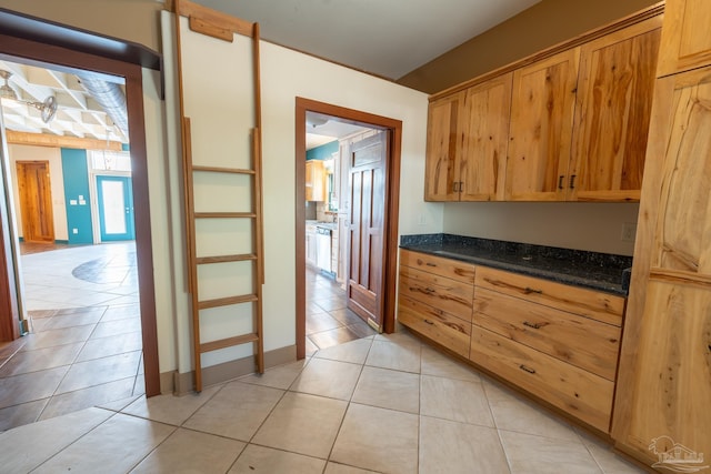 431 E Zarragossa St Unit B, Pensacola, FL 32502 - hallway featuring light tile patterned flooring and baseboards