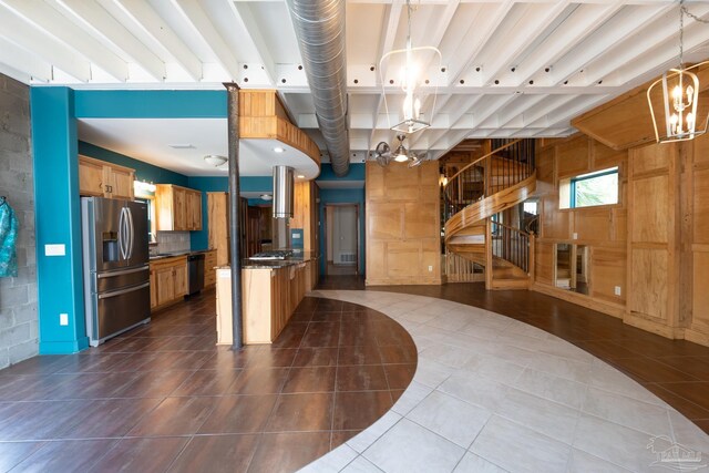 431 E Zarragossa St Unit B, Pensacola, FL 32502 - kitchen with stainless steel appliances, dark tile patterned floors, a chandelier, dark countertops, and open floor plan