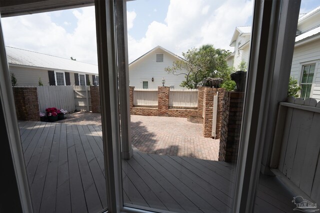 431 E Zarragossa St Unit B, Pensacola, FL 32502 - wooden deck with a fenced backyard and a patio area