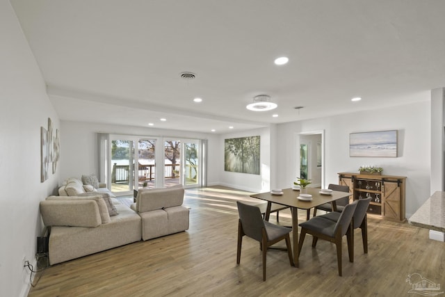 dining room featuring light hardwood / wood-style flooring