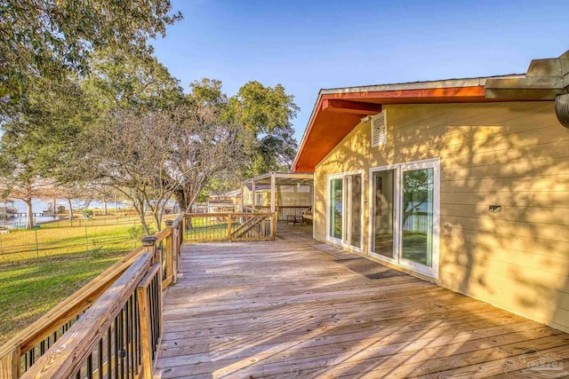 deck featuring a yard