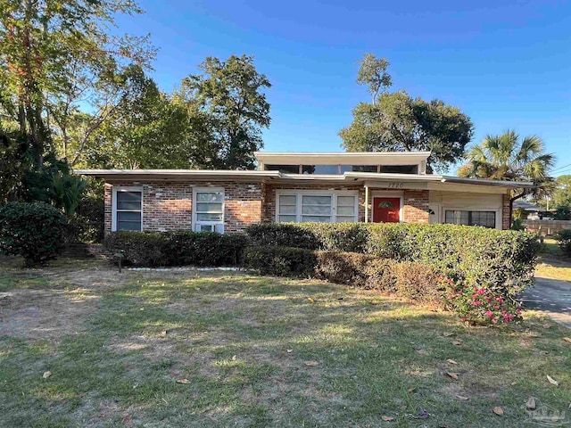 view of front of property with a front lawn