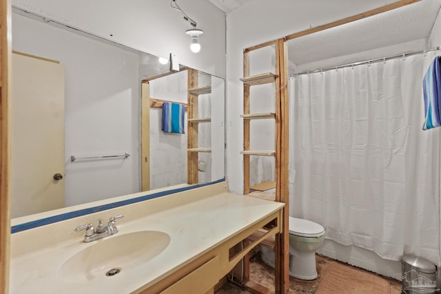 bathroom featuring toilet, shower / bath combination with curtain, and vanity