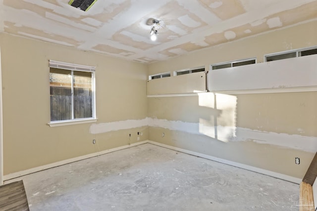 empty room featuring concrete floors