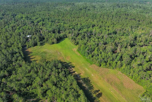 aerial view featuring a view of trees