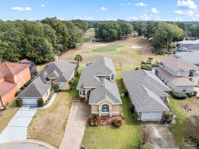 birds eye view of property with a residential view