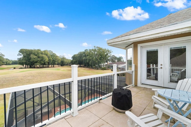 balcony with grilling area and french doors