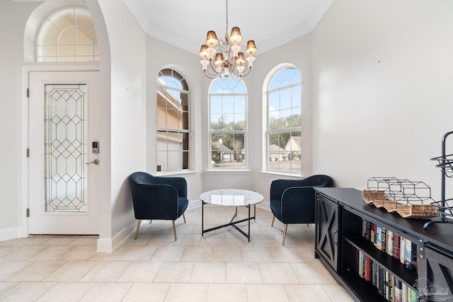 sitting room with a chandelier, light tile patterned floors, baseboards, and crown molding