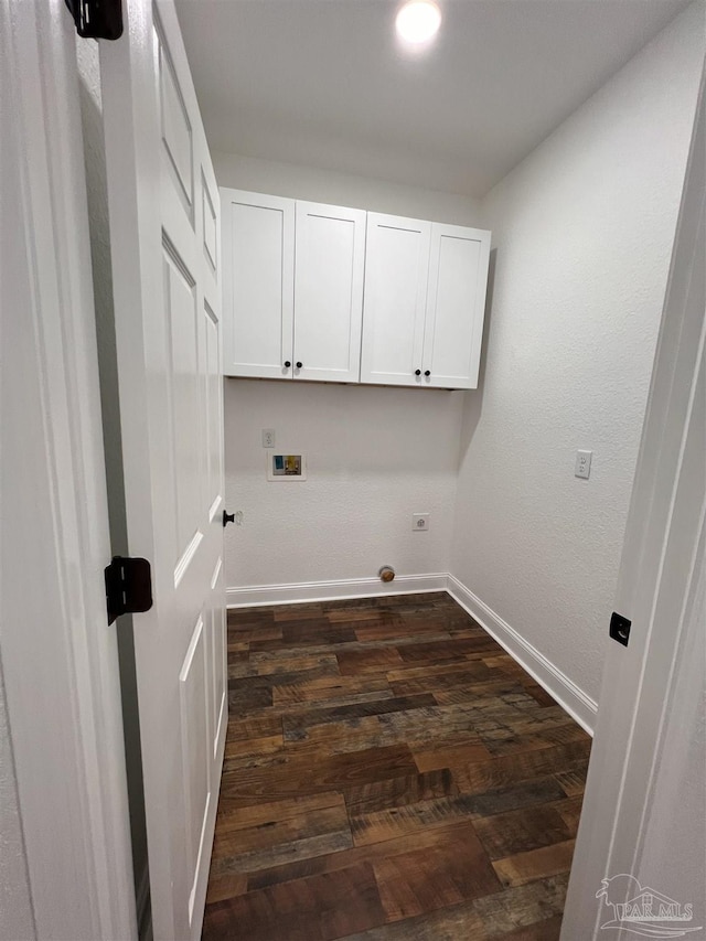 laundry area with cabinets, washer hookup, dark hardwood / wood-style floors, and hookup for an electric dryer