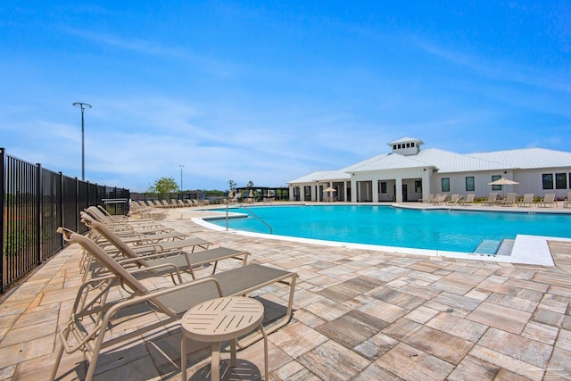 view of pool featuring a patio area