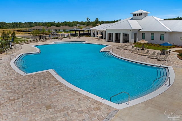 view of pool featuring a patio area