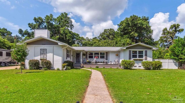 2543 Bayview Way, Pensacola, FL 32503 - ranch-style house with covered porch and a chimney