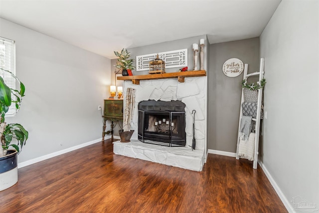 2543 Bayview Way, Pensacola, FL 32503 - living room featuring wood finished floors, baseboards, and a fireplace