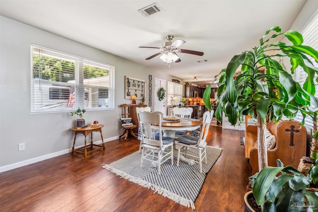 2543 Bayview Way, Pensacola, FL 32503 - dining area featuring ceiling fan, plenty of natural light, baseboards, and wood finished floors