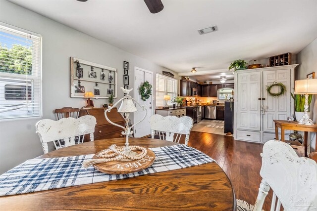2543 Bayview Way, Pensacola, FL 32503 - dining area with healthy amount of natural light, dark wood-style flooring, and a ceiling fan