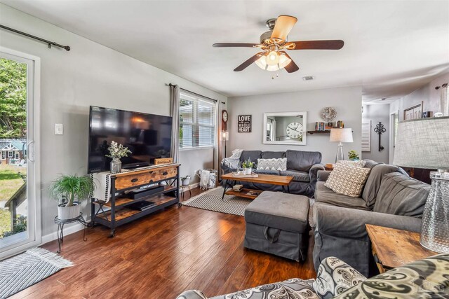 2543 Bayview Way, Pensacola, FL 32503 - living room featuring wood finished floors, a ceiling fan, plenty of natural light, and baseboards