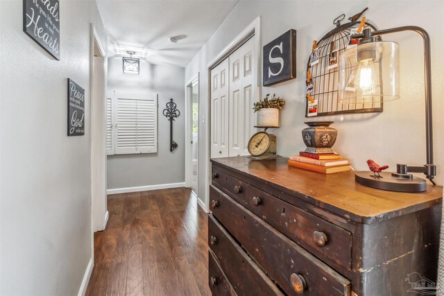 2543 Bayview Way, Pensacola, FL 32503 - hall with dark wood-style flooring and baseboards