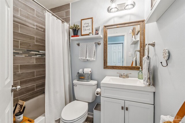 2543 Bayview Way, Pensacola, FL 32503 - bathroom with toilet, vanity, and shower / tub combo with curtain