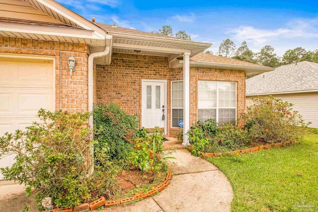 property entrance with a garage