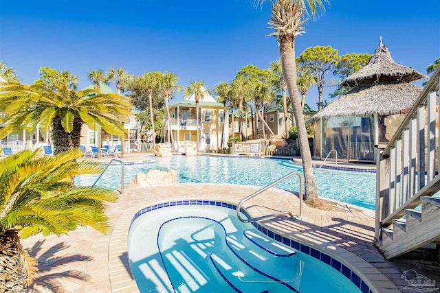 13555 Perdido Key Dr Unit A17U, Pensacola, FL 32507 - community pool featuring a hot tub, a patio area, and a gazebo