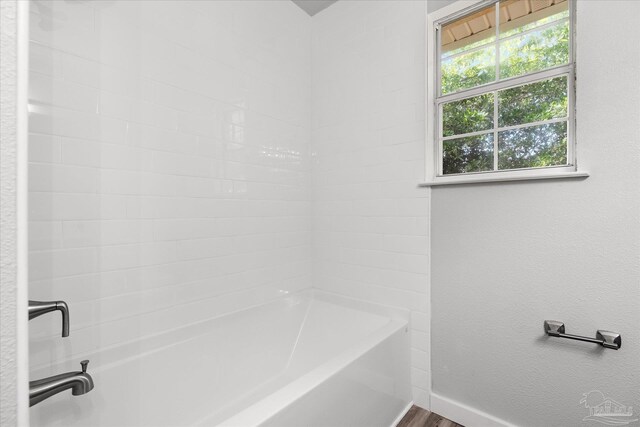 bathroom featuring wood-type flooring