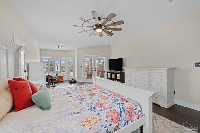 bedroom with access to exterior, ceiling fan, baseboards, and dark wood-type flooring