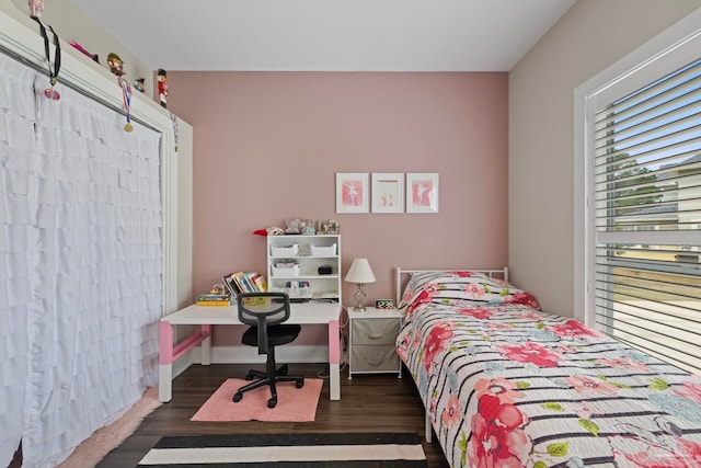 bedroom featuring wood finished floors