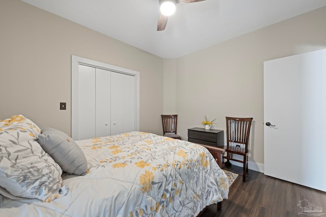 bedroom featuring a closet, dark wood finished floors, and a ceiling fan