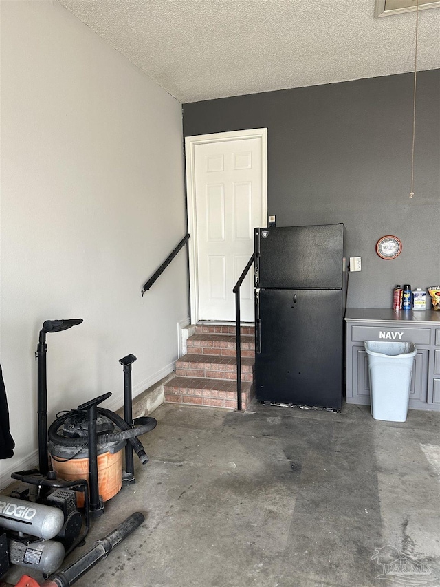 interior space featuring freestanding refrigerator