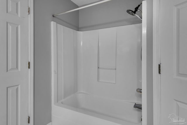 bathroom with shower / bathtub combination