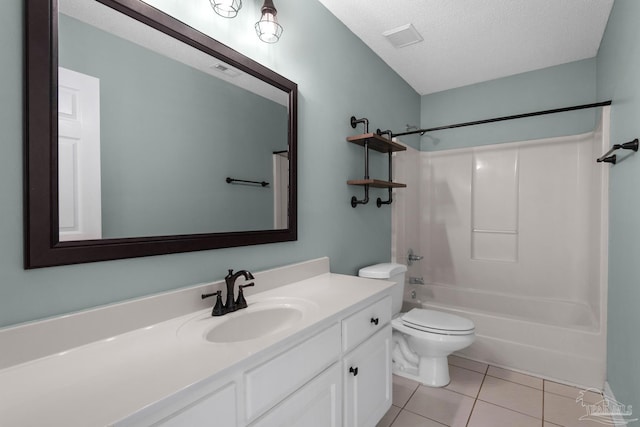 full bathroom with toilet, a textured ceiling, shower / washtub combination, vanity, and tile patterned flooring