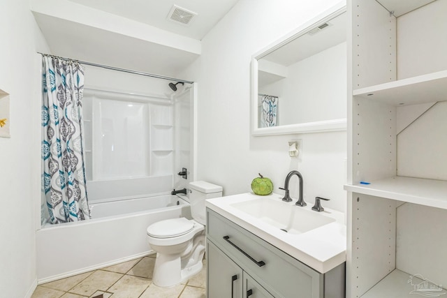 full bathroom featuring toilet, vanity, tile patterned floors, and shower / bath combo with shower curtain