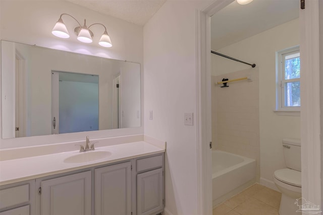 full bathroom featuring shower / bathing tub combination, vanity, toilet, tile patterned floors, and a textured ceiling