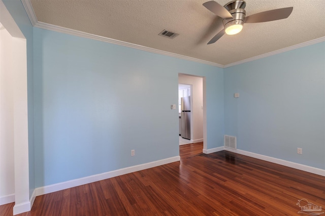 unfurnished room featuring crown molding, dark hardwood / wood-style flooring, and a textured ceiling