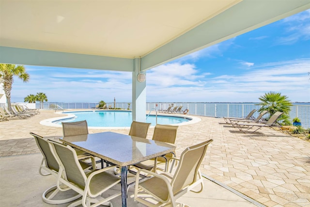 154 Ethel Wingate Dr Unit 109, Pensacola, FL 32507 - view of patio / terrace featuring a water view and a community pool