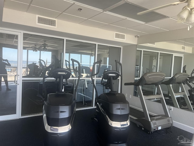 154 Ethel Wingate Dr Unit 109, Pensacola, FL 32507 - exercise room with a healthy amount of sunlight, ceiling fan, and a drop ceiling