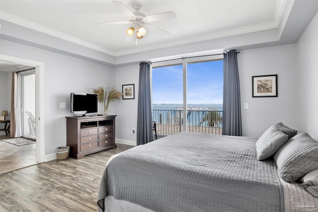 154 Ethel Wingate Dr Unit 109, Pensacola, FL 32507 - bedroom featuring ornamental molding, light hardwood / wood-style flooring, access to exterior, and ceiling fan