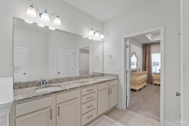 bathroom with vanity and tile patterned floors