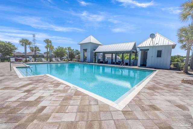 view of pool with a patio and a gazebo