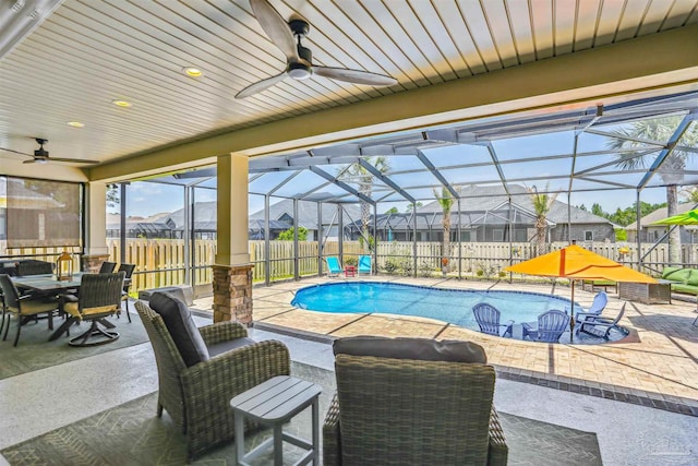 view of pool featuring a fenced backyard, ceiling fan, and a patio area